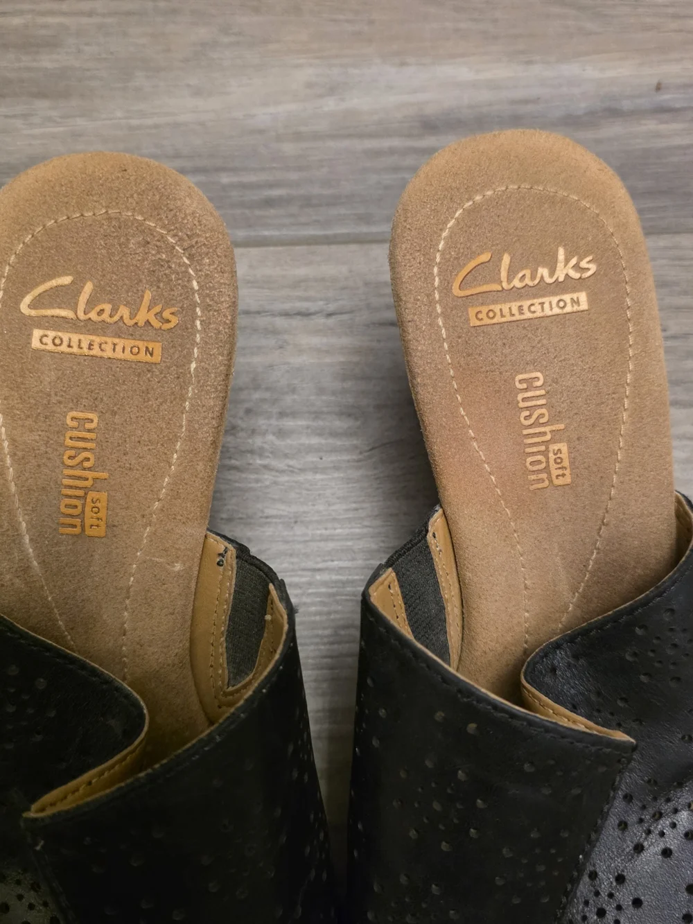 Clarks Women's Black Perforated Slip-On Sandals